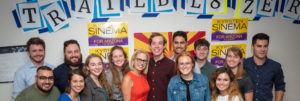 Kyrsten Sinema stands with young campaign volunteers.